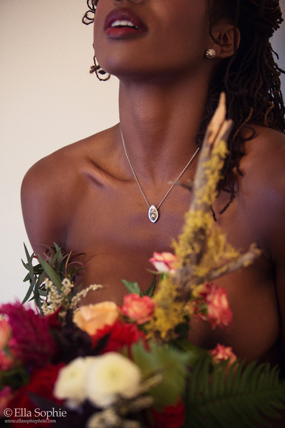close up collar bones and neck boudoir photo by ella sophie