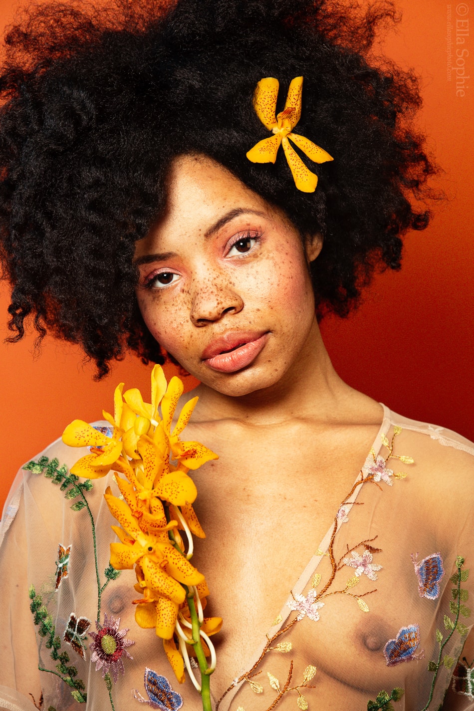 Natural Beauty Portrait, Yellow Orchids, freckles, afro hair, 