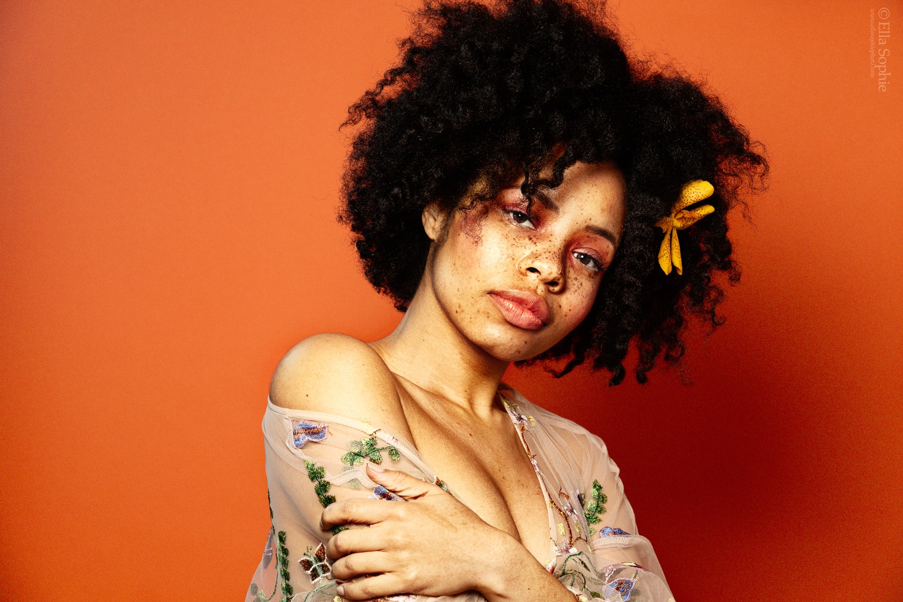 SF photographer Ella Sophie, natural beauty portraits, empowering women freckles afro flowers