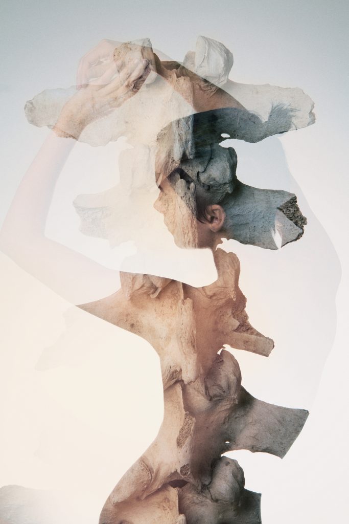 Multiple-exposure photo showing back of model Corie Shannon and spine. By Ella Sophie, Obscured Light Series. Oakland CA