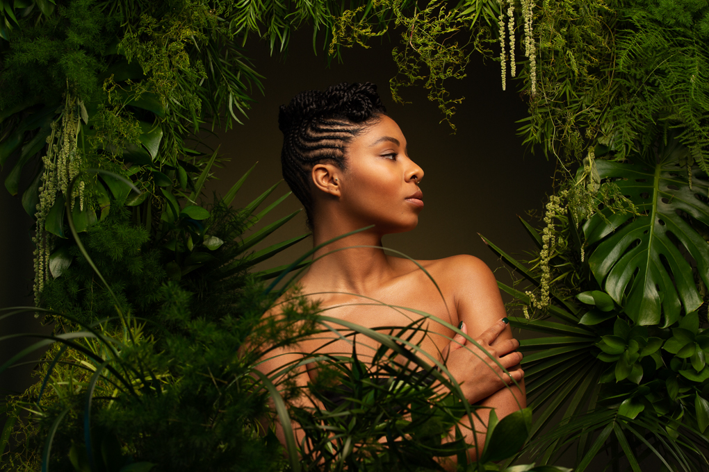 Beauty portrait in green plant environment By women's empowerment photographer Ella Sophie