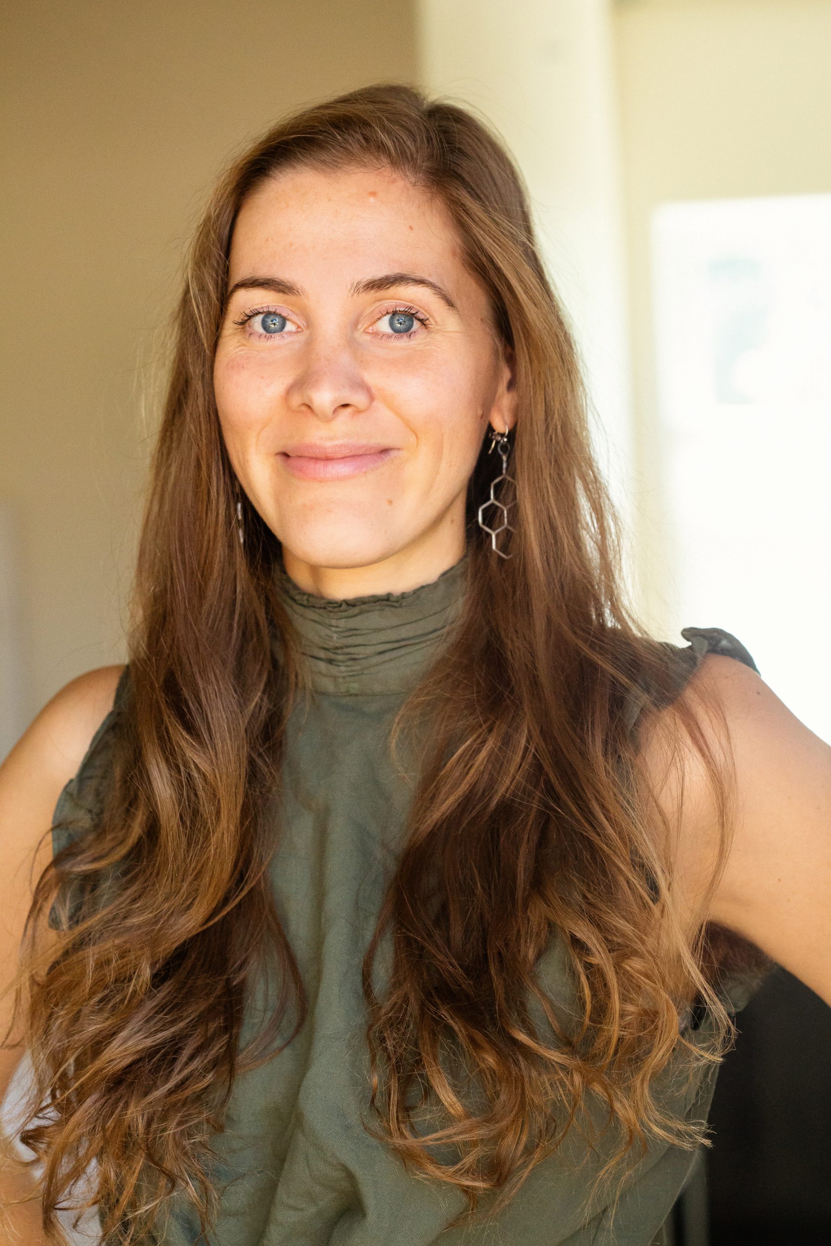 Close up natural professional portrait of healthcare professional Dr. Clara Wetmore in her clinic. Photography by Oakland photographer Ella Sophie. 