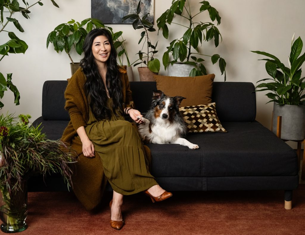 Approachable and personable portrait, photographer Ella Sophie, Oakland CA. Annie shaking paw of her shepherd dog.
