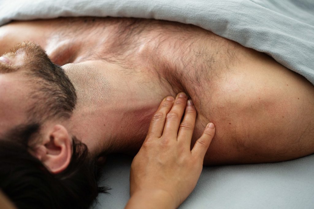 Lifestyle photography for Oakland CA massage studio, showing neck pressure point. 